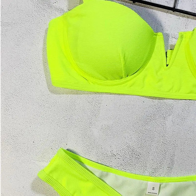 Neon Green Bikini – Underwired, high waist, push-up two-piece.