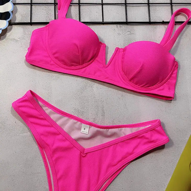 Neon Green Bikini – Underwired, high waist, push-up two-piece.