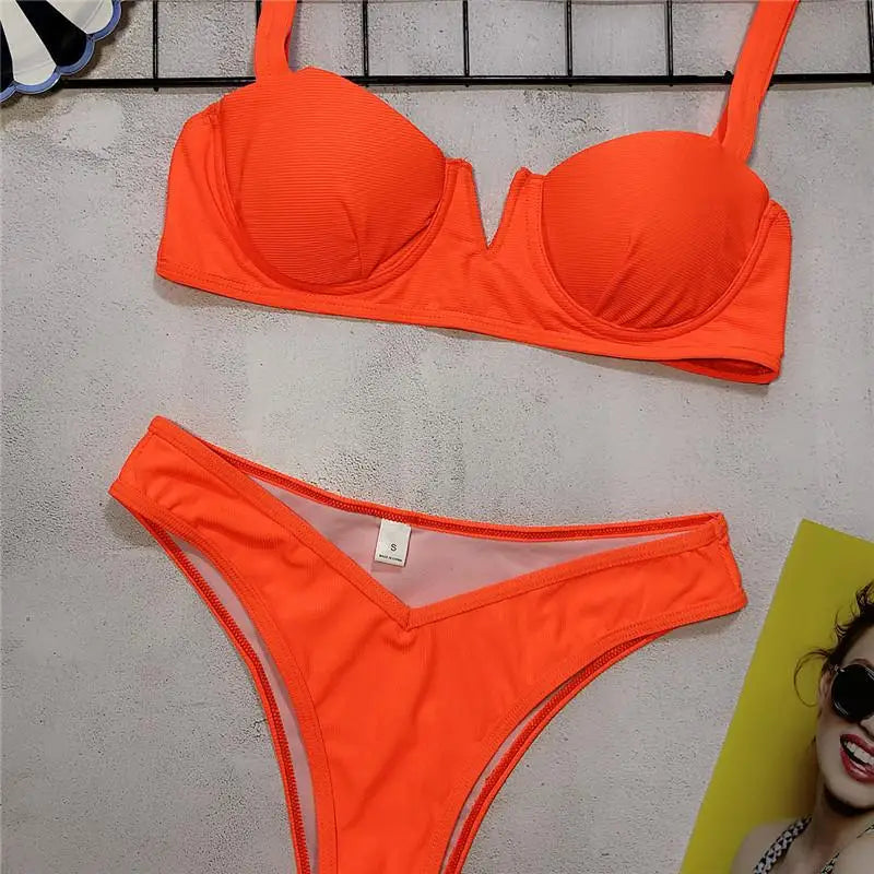 Neon Green Bikini – Underwired, high waist, push-up two-piece.