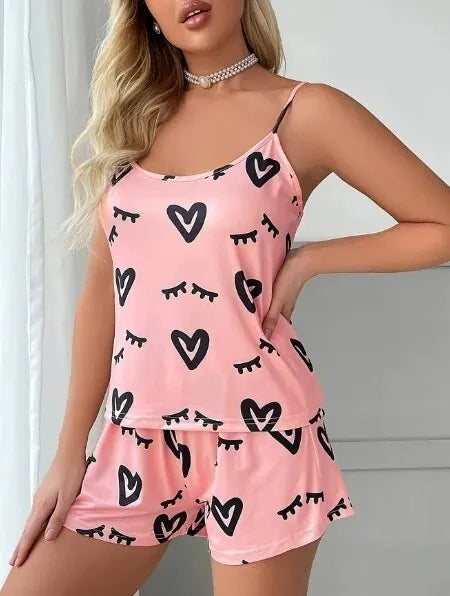 Heart print pajama set, sleeveless cami top & bow shorts, women’s loungewear.